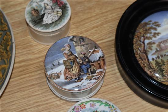 A group of Prattware plates, a mug and pot lids